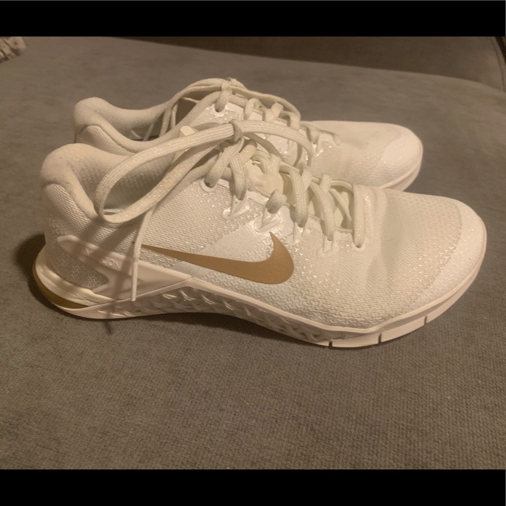 Nike 7.5 womans Metcons gold